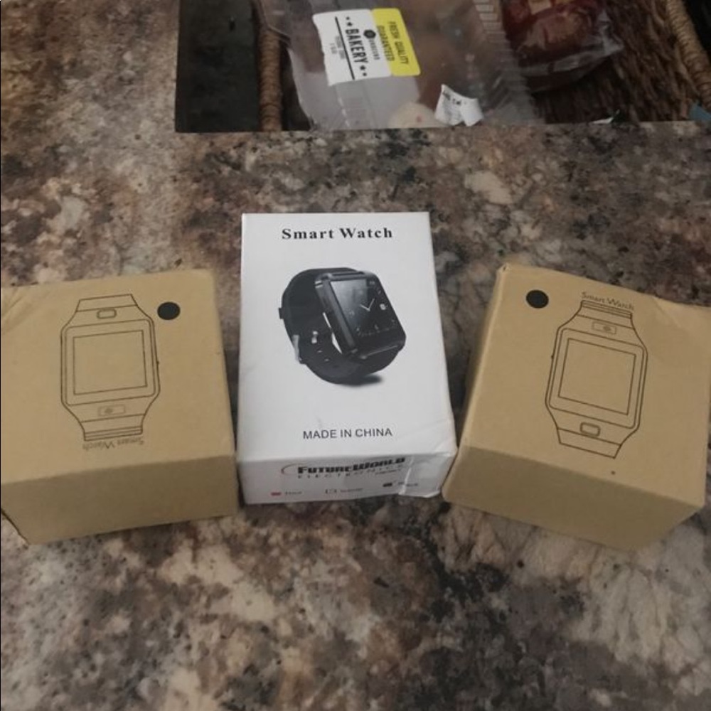3 unopened smart watches